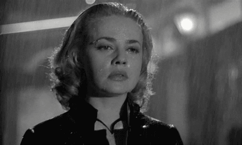 Upset Jeanne Moreau Walking In The Rain GIF