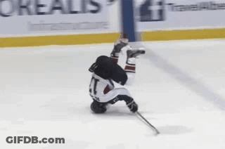 Upside Down Hockey Player On Ice GIF