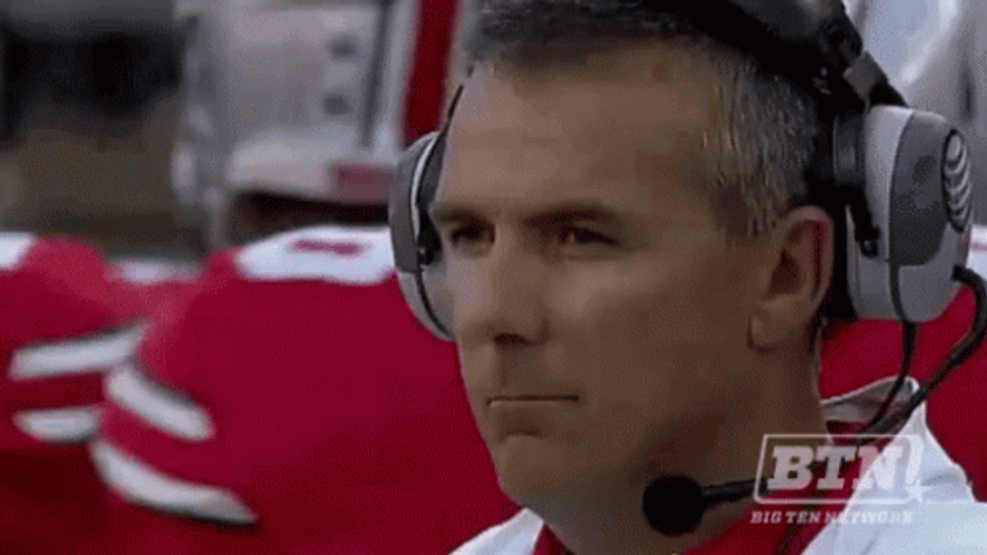 Urban Meyer Serious Smile GIF