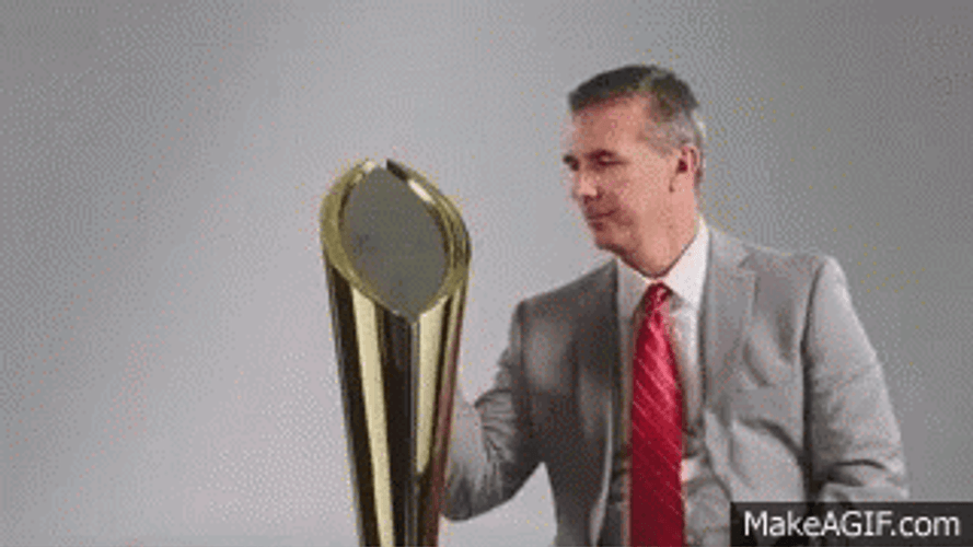 Urban Meyer Wiping Trophy GIF
