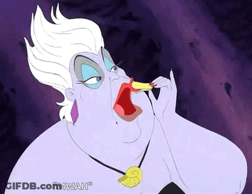 Ursula From The Little Mermaid Eating A Piece Of Food GIF