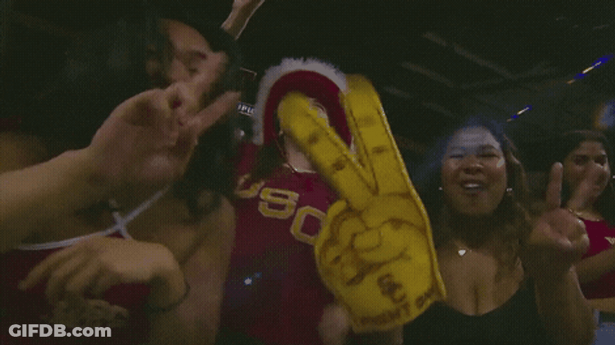 Usc Fan Wearing Cowboy Hat While Cheering GIF
