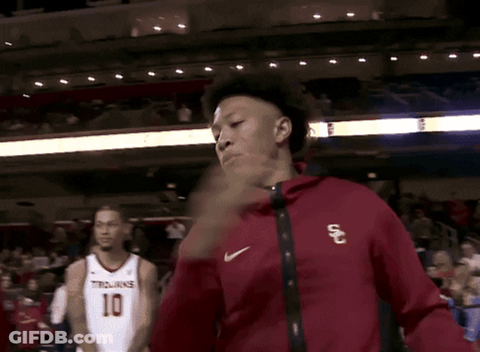 Usc Player Doing Hand Shake With Teammate GIF