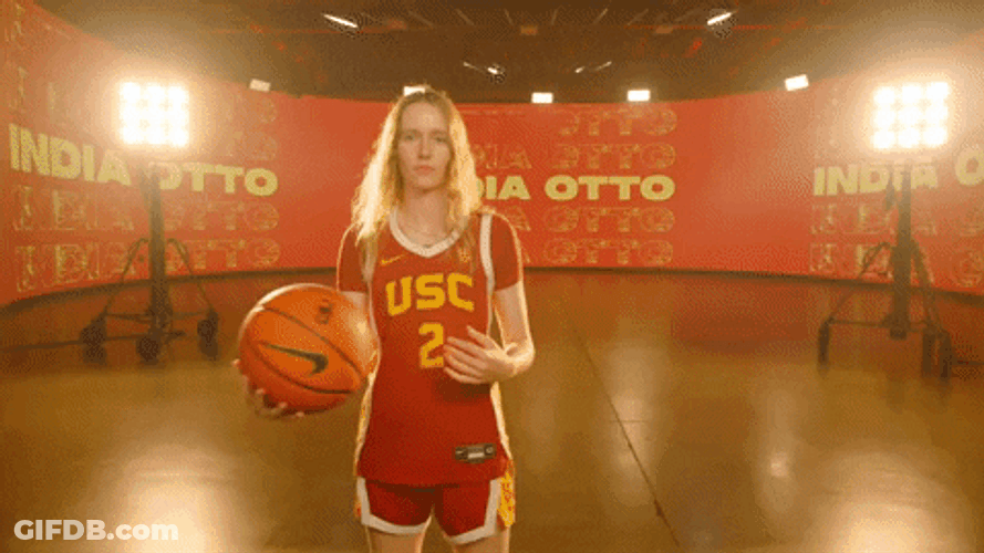 Usc Player Holding Ball On Shoulder GIF