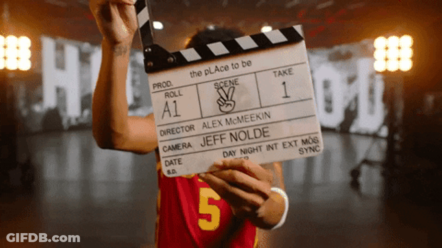 Usc Player Holding Clapperboard GIF