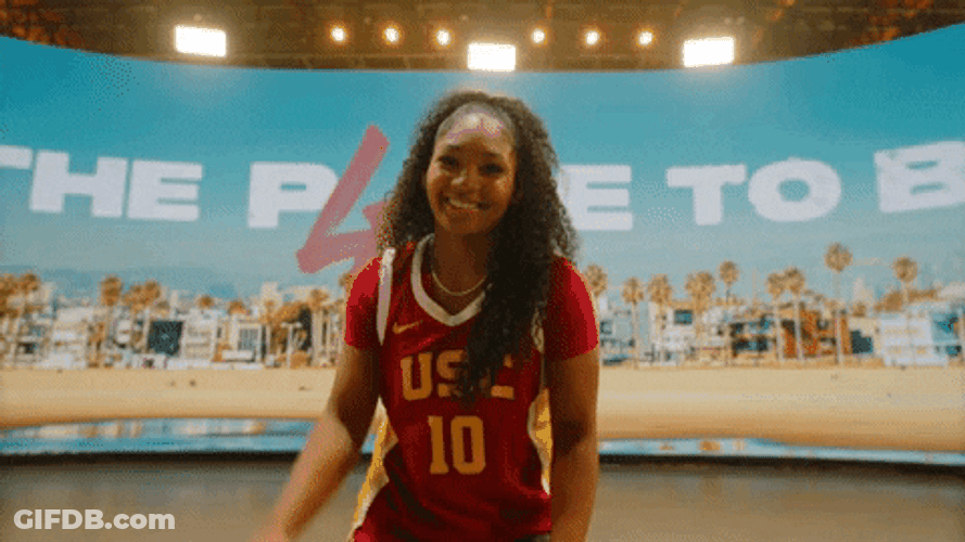 Usc Woman Happily Dribble For Pose GIF