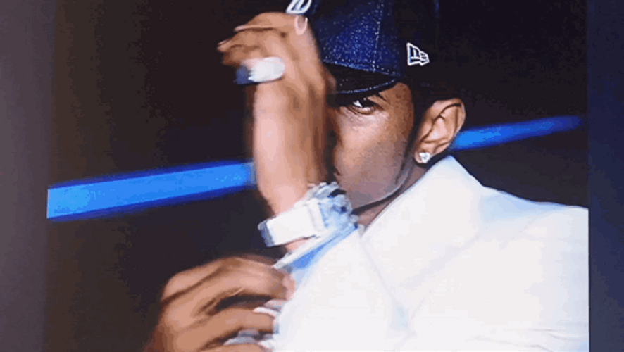 Usher In White Coat Performing GIF