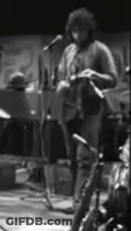 Using Cowbell As Music Instrument GIF