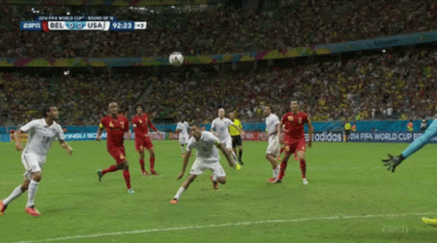 Usmnt Player Kicking Ball Above Goal GIF