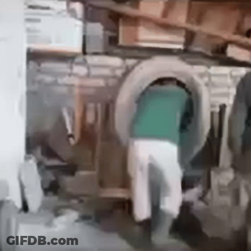 Uwii Man Rotating In Cement Mixer GIF