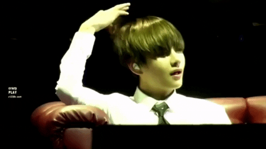 V Curling His Hair GIF