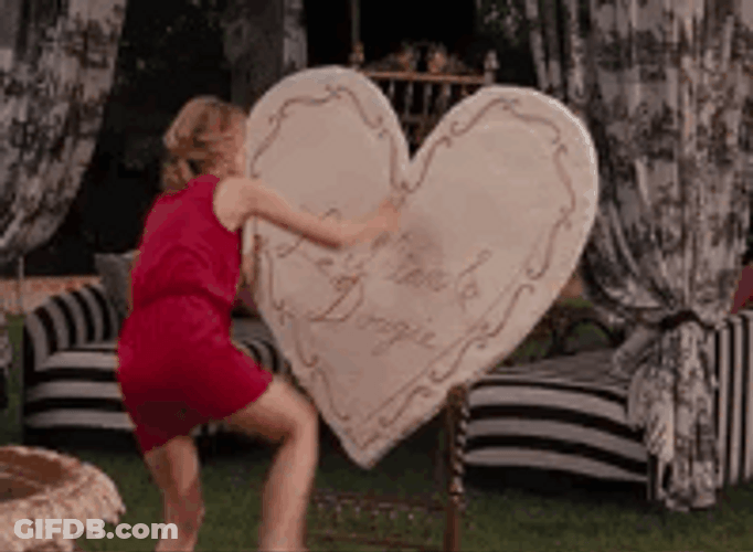 Valentines Day Mad Woman Kicking Heart Display GIF