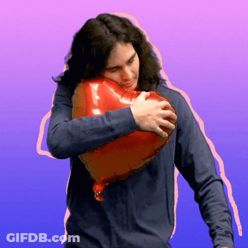 Valentines Day Sweet Guy Hugging Heart Balloon GIF
