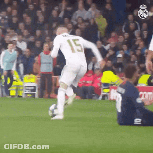 Valverde Running And Driving The Ball Against Opponent GIF
