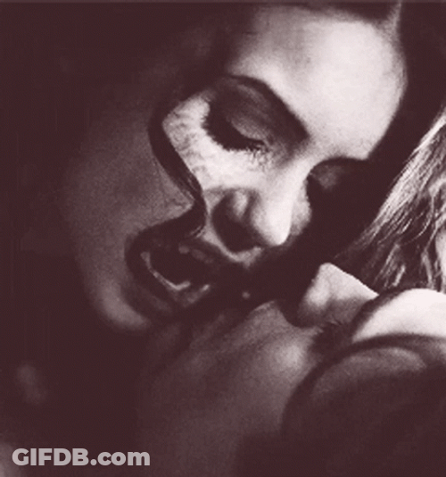 Vampire Bites Man's Neck GIF