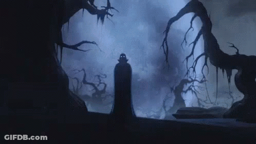 Vampire Standing In Dark Forest GIF