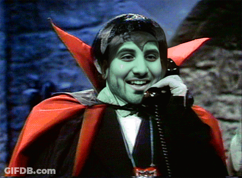Vampire Talking On Telephone GIF