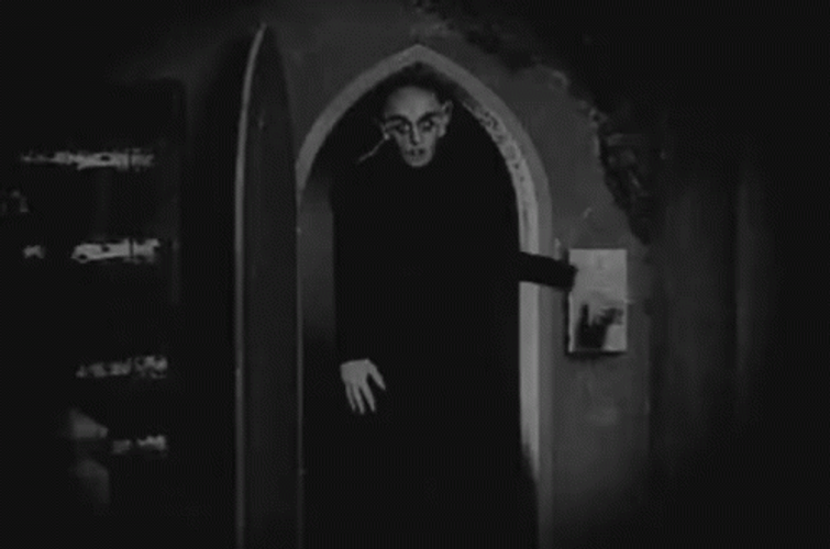 Vampire Turning Off And On Light GIF