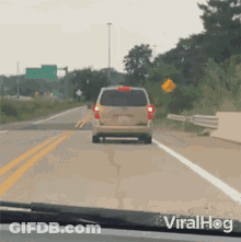 Van Driving Past Viralhog Sign GIF