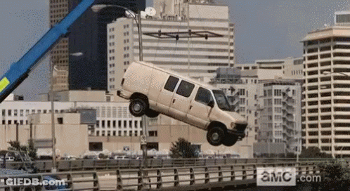 Van Lifted Over Bridge By Crane With AMC.com GIF