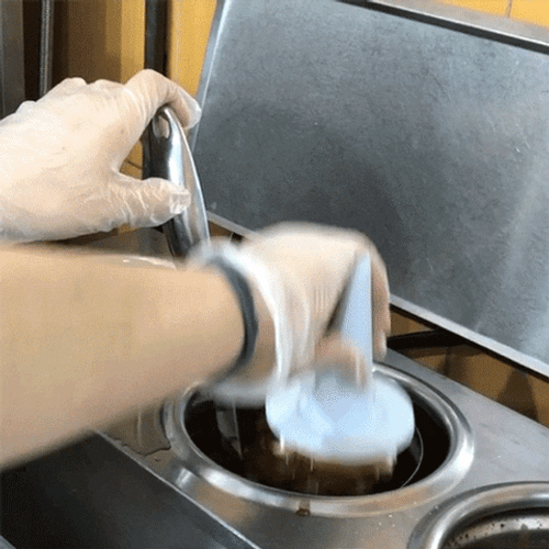 Vanilla Ice Cream Dip Into Chocolate GIF
