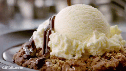 Vanilla Ice Cream Scoop On Brownie With Chocolate Sauce GIF