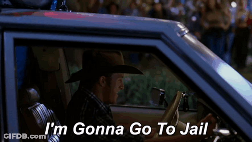 Varsity Blues Man Driving Police Car GIF