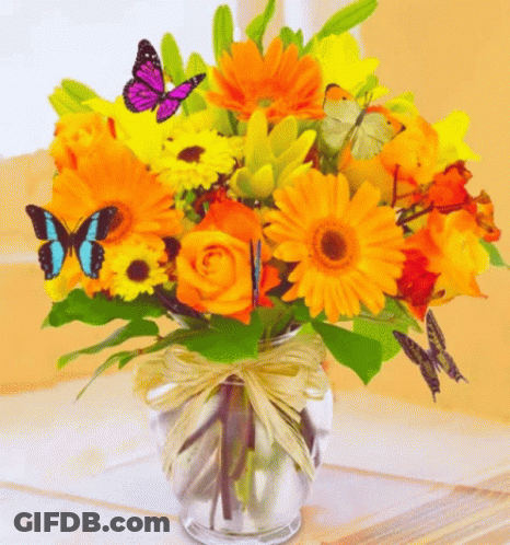 Vase With Yellow And Orange Flowers And Butterflies GIF