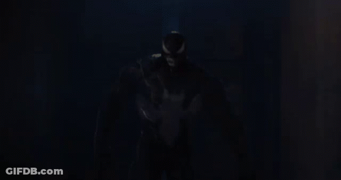 Venom Looking At Camera In Dark GIF