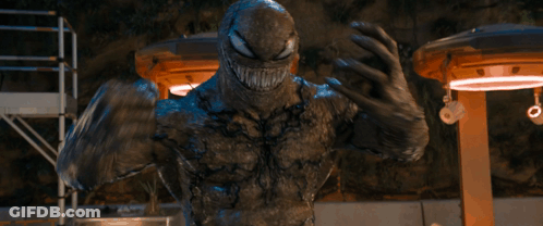 Venom Statue Arms Crossed Mouth Open GIF