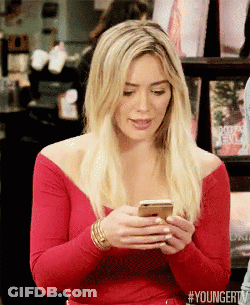 Vibrant Hillary Duff Texting GIF