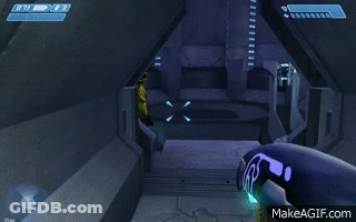 Video Game Being Played With Man Holding Lightsaber GIF