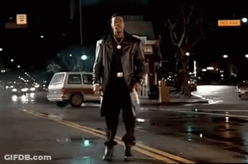 Video Game Character Holding Gun Walking On Yellow Carpet GIF