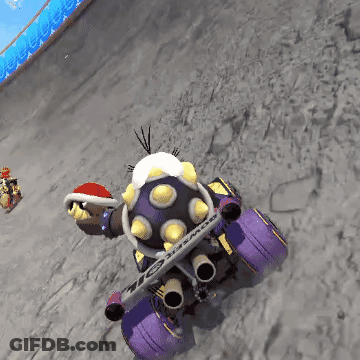 Video Game Character In Santa Hat On Purple Vehicle GIF