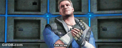 Video Game Character Saying Talk To Me Holding Grenade GIF