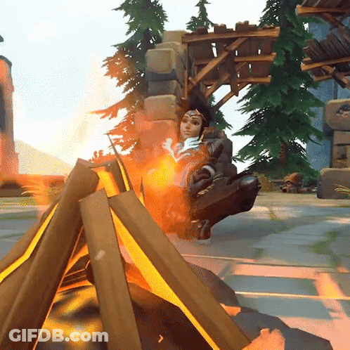 Video Game Character Sitting Around Fire Pit GIF
