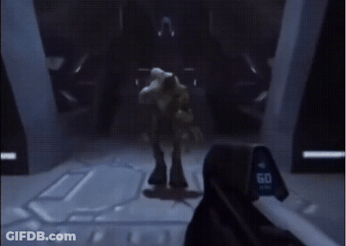 Video Game Played In Dark Room With Person Standing GIF