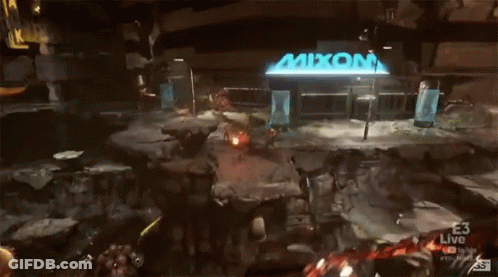 Video Game Played In Front Of Mixom Building GIF