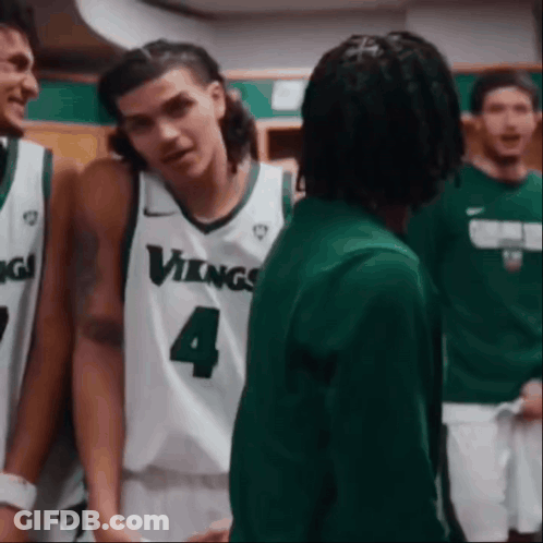 Vikings Basketball Players Talking In Locker Room GIF