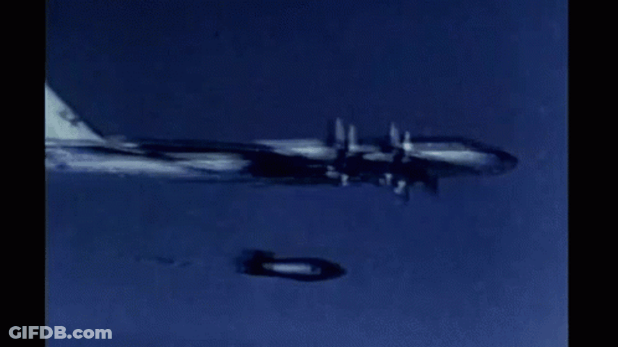 Vintage Airplane Dropping Atomic Bomb GIF