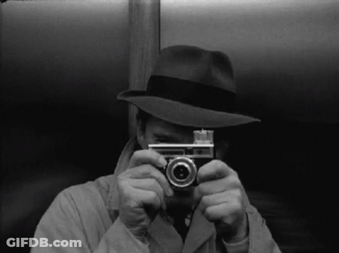 Vintage Detective Clicking Picture GIF