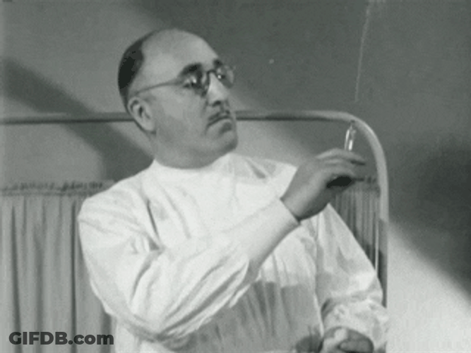 Vintage Doctor Holding Syringe GIF