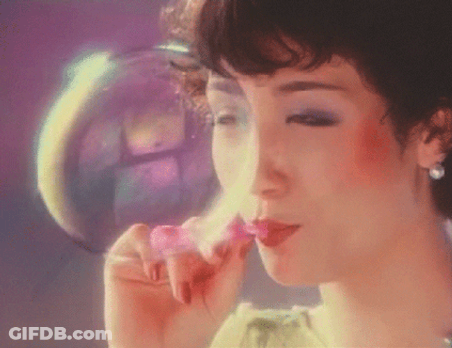 Vintage Retro Girl Popping A Bubble GIF