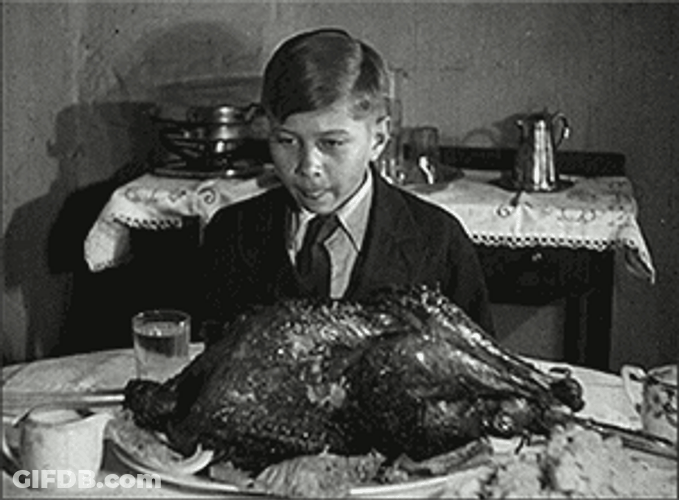 Vintage Thanksgiving Dinner Boy Looking At Turkey GIF