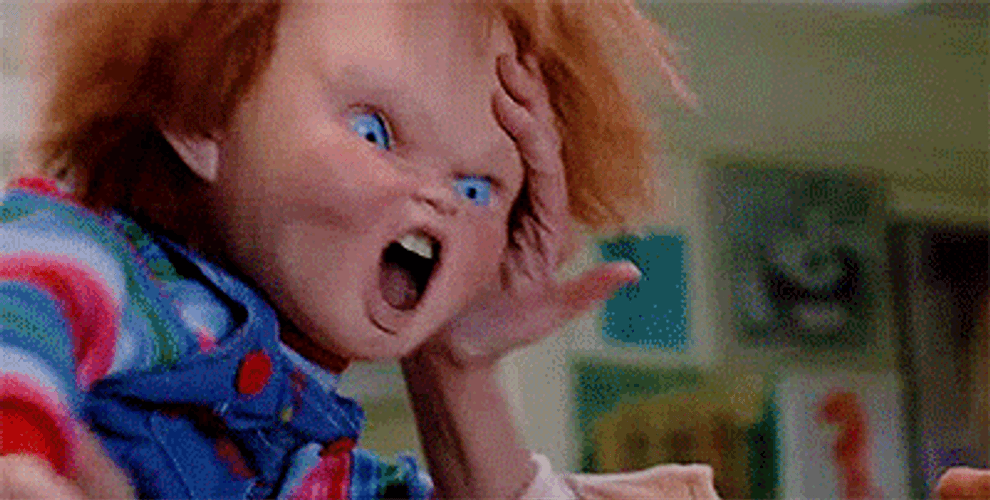 Violent Chucky Biting Child's Play GIF