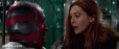 Vision And Scarlet Witch Looking At Each Other GIF