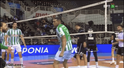 Volleyball Players In Front Of Ponia Sign GIF