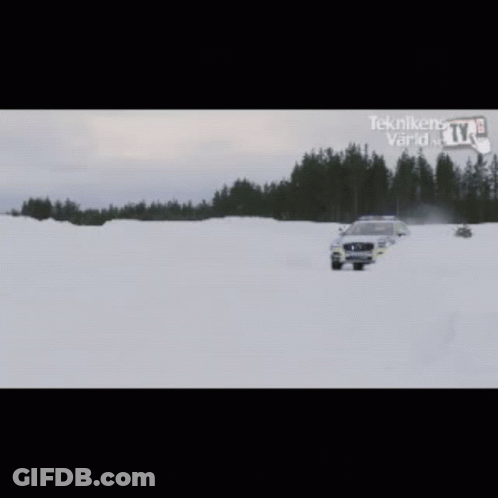 Volvo Police Car Driving In Snow With Ym25c08 Plate GIF