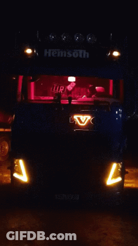 Volvo Truck Lit Up In Dark GIF