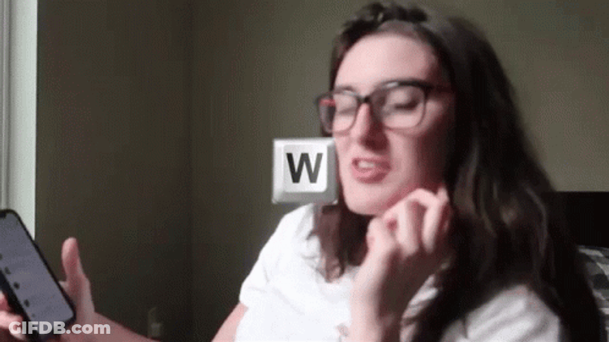 W Key Woman Holding Phone GIF